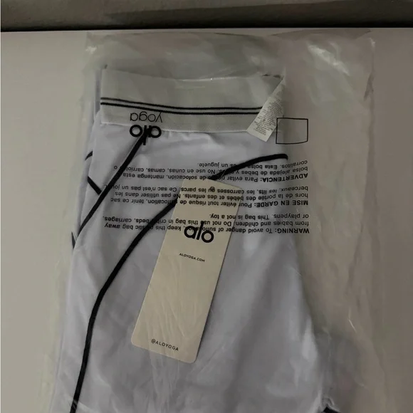 ALO Yoga White and Black Trim Sports Bra - Picture 3 of 3